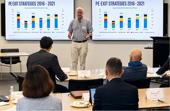 Mark Richardson presenting PE exit strategies at a private equity enablement workshop
